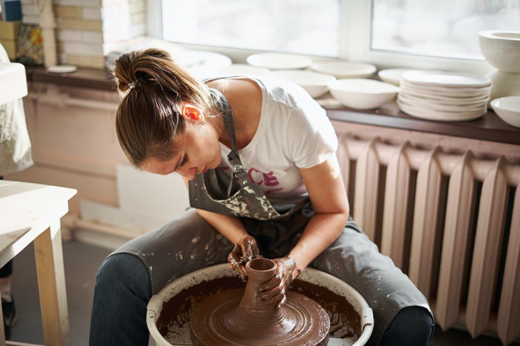 Woman freelance, business, hobby. Woman making ceramic pottery